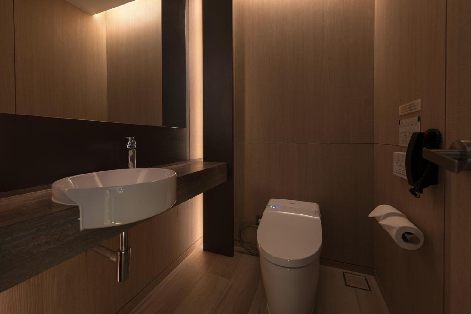 Mu Jiaoxi Hotel Zewnętrze zdjęcie A modern bathroom
