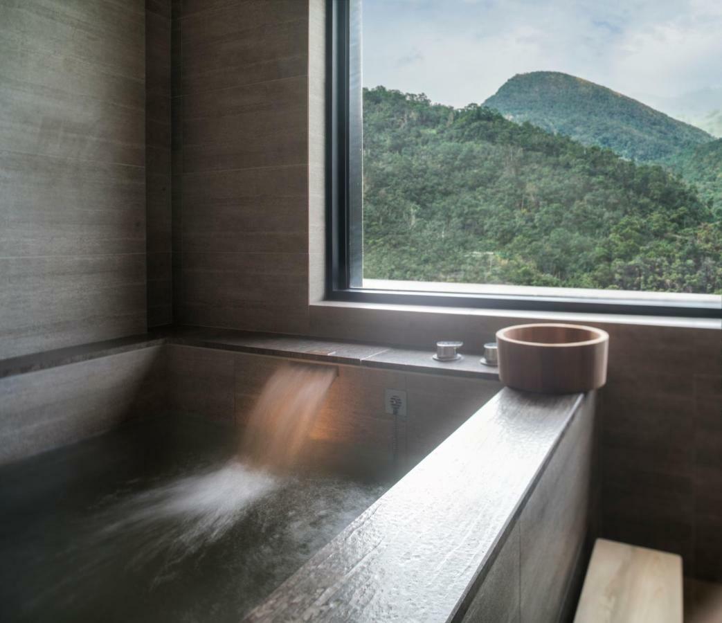 Mu Jiaoxi Hotel Zewnętrze zdjęcie A modern onsen bath